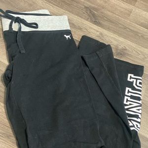 Black flare joggers or leggings by pink